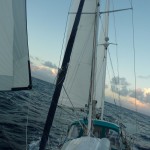 Full sail up, last sunset at sea