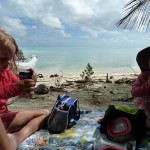 Picnicking on a deserted beach in paradise (Fakarava)