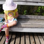 Leah sketches the Rangitoto summit marker